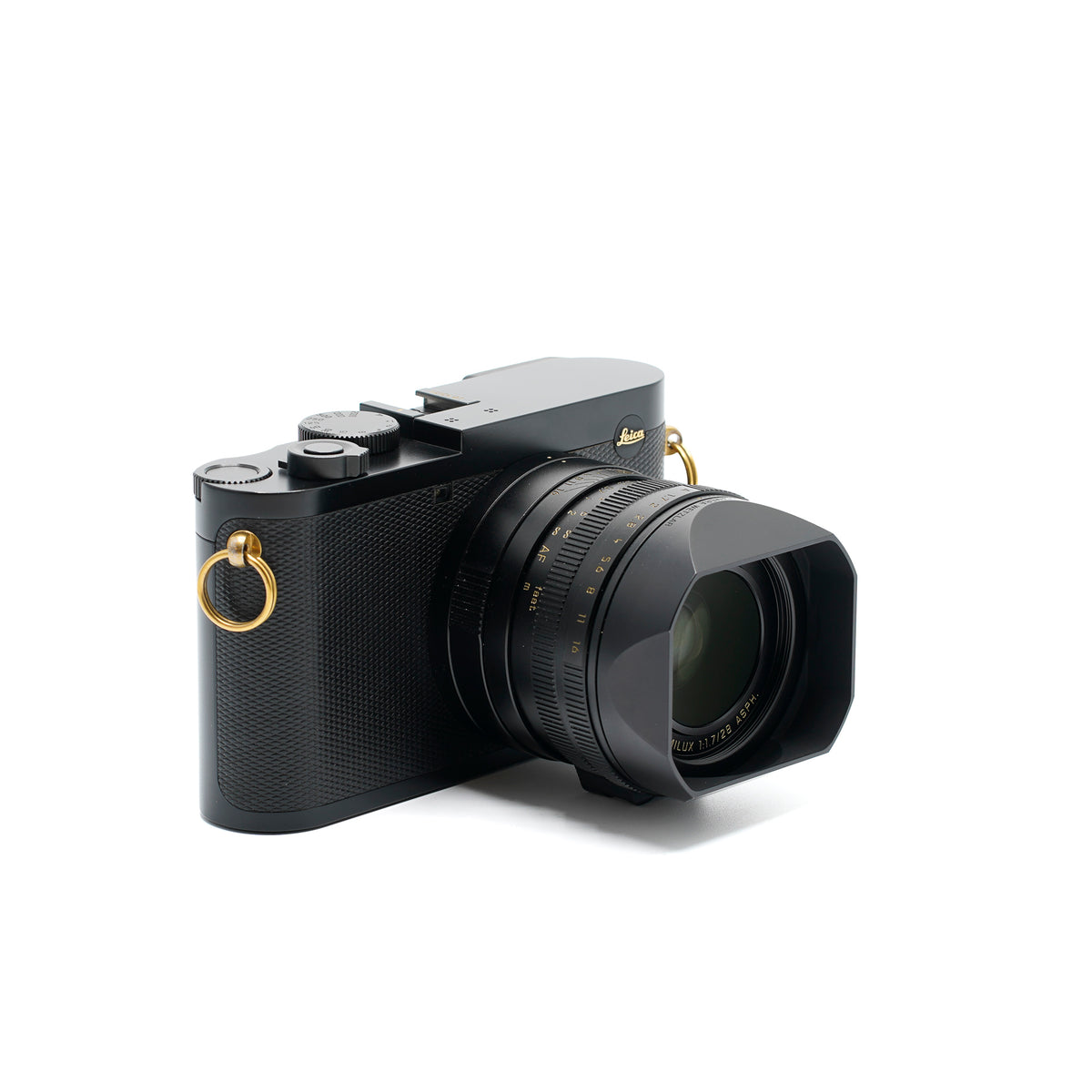 Leica Q2 Daniel Craig x Greg Williams mit Protektor schwarz und Holster Q2 schwarz