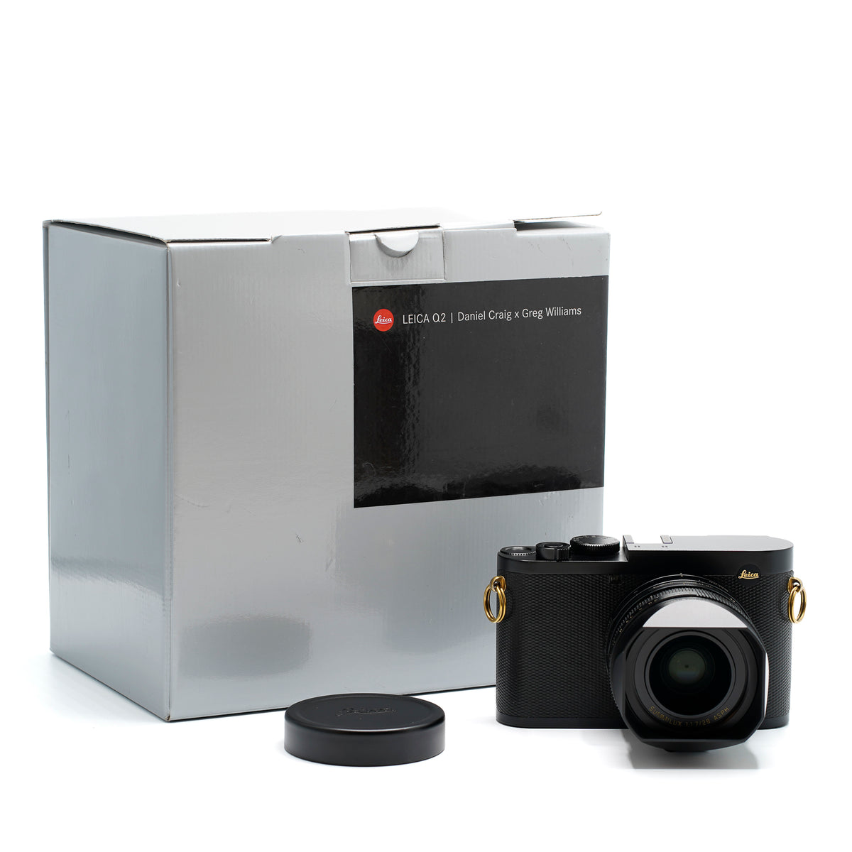 Leica Q2 Daniel Craig x Greg Williams mit Protektor schwarz und Holster Q2 schwarz
